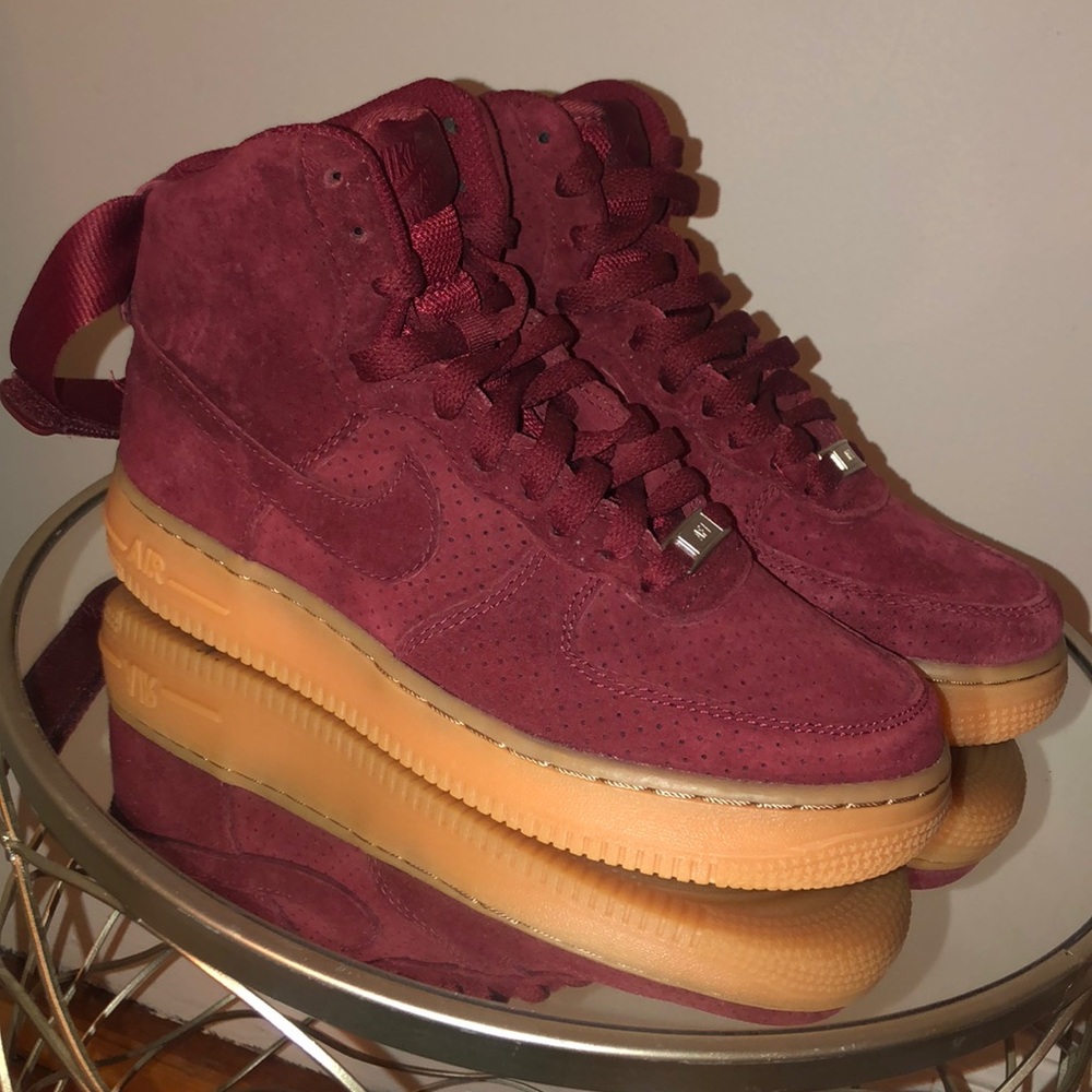 Burgundy high top Air Force 1s